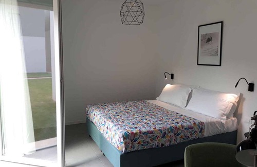 Cisano Apartamento | Holiday apartment with outdoor pool and balcony