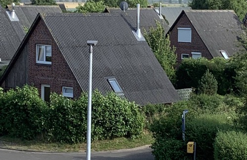Friedrichskoog-Spitze Casa | Casa de vacaciones "Friedrichskoog - Spitze" con terraza descubierta y jardín