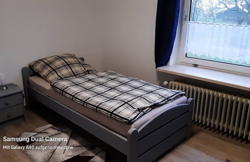 Großheide Casa | Holiday home at the marriage -upper apartment-