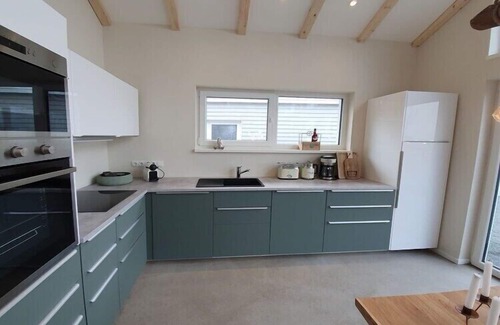 Wangerland Apartamento | Casa de vacaciones Chalet Wilde Wiese