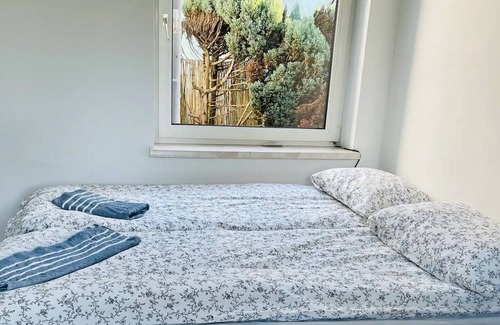 Favoriten Casa | Casa de vacaciones "Cheerful Tiny House" con jardín privado