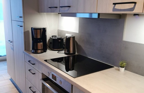 Schulp Casa | Holiday Home 'Ferienhäuser Ebbe Und Flut' with Private Terrace, Private Garden and Wi-Fi