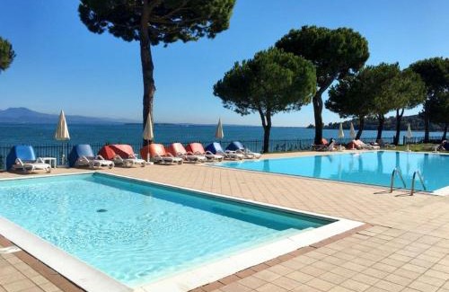 Monte Casa | Holiday Home Front Lake Resort Le Corti del Lago-4 by Interhome