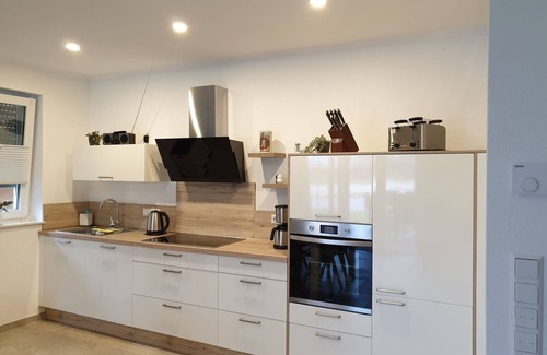 Walchum Casa | Apartamento vacacional "Haus Seestern" con vistas al lago, terraza privada y Wi-Fi