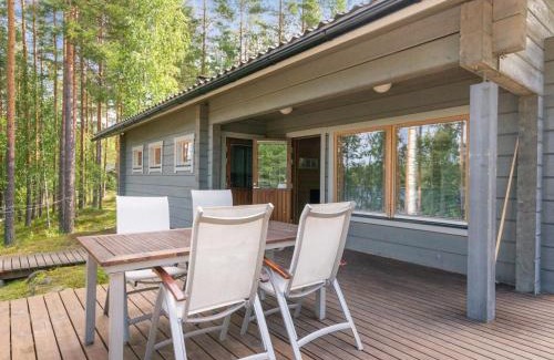 Enonkoski Casa | Holiday Home Hot pool cottage ainu by Interhome