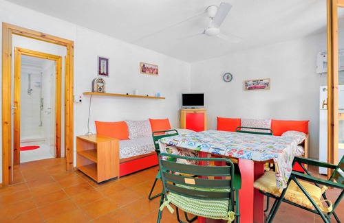 Cugnana Verde Casa | Casa de vacaciones 'Libeccio 2417' con piscina compartida, terraza privada y balcón