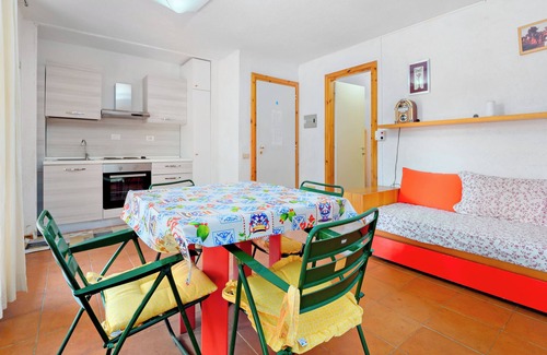 Cugnana Verde Casa | Casa de vacaciones 'Libeccio 2417' con piscina compartida, terraza privada y balcón