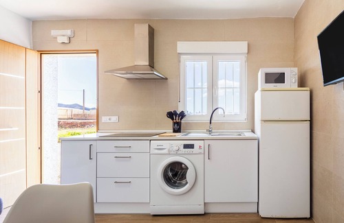 Pujaire Casa | Casa de vacaciones 'Nido' con terraza privada y aire acondicionado