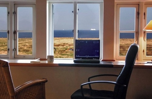 Langeneß Casa | Casa de vacaciones 'Reethuus Am Fething' con vistas al mar, jardín privado y Wi-Fi