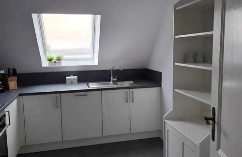 Friedrichskoog Casa | Casa de vacaciones 'Timeout' con terraza privada, jardín junto al canal y Wi-Fi