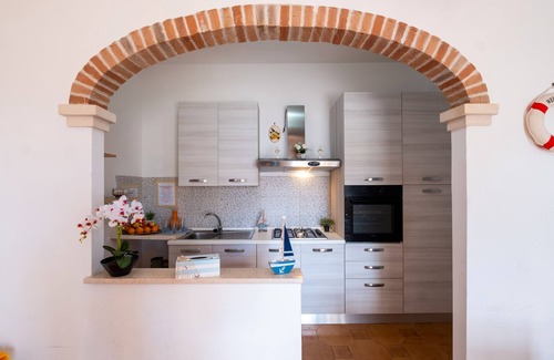 La Strea Casa | Casa de vacaciones 'Villetta Privata Hoana Sul Mare' con vistas al mar, jardín y aire acondicionado