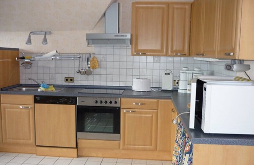 Neuharlingersiel Apartamento | FEWO1 para familias, también con un perro, vista del dique y un corto paseo a la playa