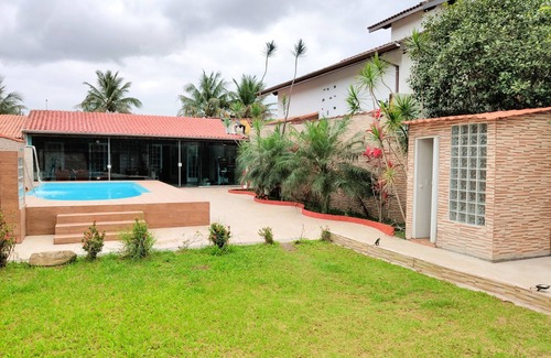 Jardim das Cancoes Casa | Casa de vacaciones con piscina en Bertioga, a 200 metros de la playa
