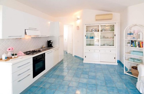Baia Sant'Anna Casa | Casa de vacaciones con jardín a 400 metros de la playa de Porto Ainu