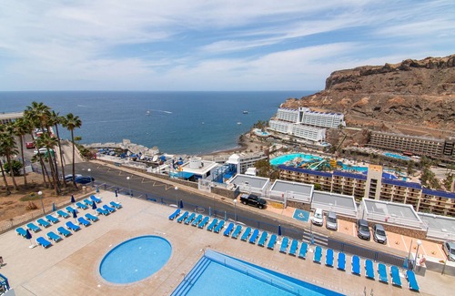 Taurito Apartamento | Vacaciones 'Stunning Sunset Ocean View' con vistas al mar, piscina compartida y Wi-Fi