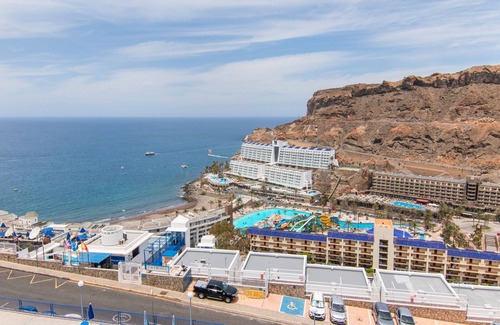 Taurito Apartamento | Vacaciones 'Stunning Sunset Ocean View' con vistas al mar, piscina compartida y Wi-Fi