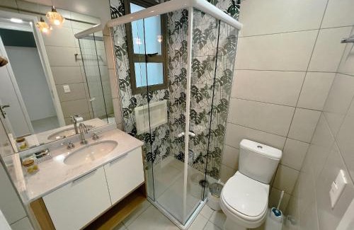 Vila Clais Casa | Home 49 I Apto pé na areia e piscina aquecida em Bertioga
