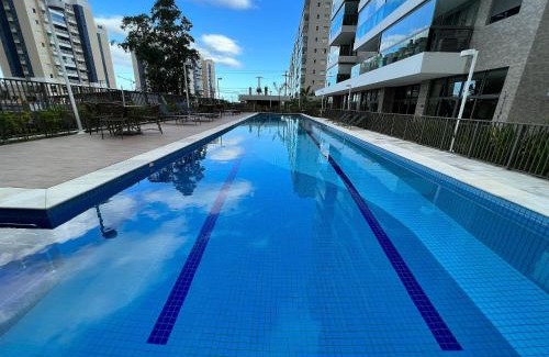 Vila Clais Casa | Home 49 I Apto pé na areia e piscina aquecida em Bertioga