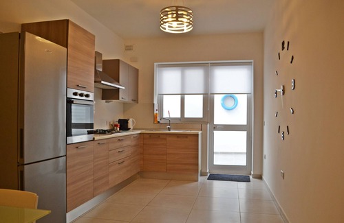 Marsaxlokk Apartamento | Home a few meters from promenade, restaurants, beach, bus stop & parking.