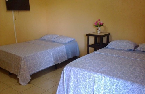 La Cruz Apartamento | ¡Hogar lejos del hogar! ¡Acogedor, limpio y seguro hotel a minutos de la hermosa playa!