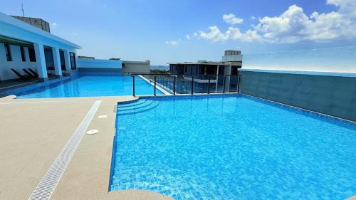 Oyster Bay Apartamento | Home in the Heart of Peninsula
