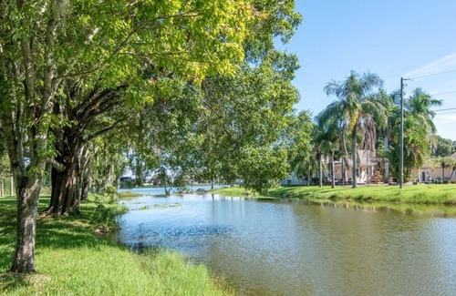 Westchase Casa | Home on private lake. Kayaks, Fire Pit, Safe, Peaceful, Quiet, Best Location!