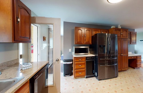 South Burlington Casa | Dog-friendly home with mountain view, large yard, fire pit, & 3-season room