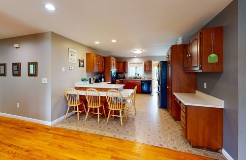 South Burlington Casa | Dog-friendly home with mountain view, large yard, fire pit, & 3-season room