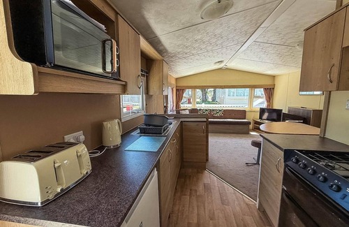 Walton on the Naze Casa | Homely 8 berth caravan with decking to relax on at Naze Marine, ref 17009WC