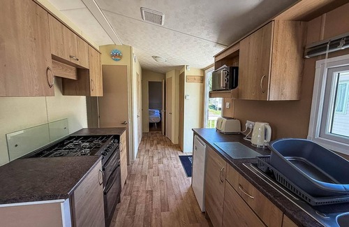 Walton on the Naze Casa | Homely 8 berth caravan with decking to relax on at Naze Marine, ref 17009WC