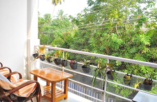 Kovalam Apartamento | Ambiente acogedor d apartamento completamente amueblado con personal amable