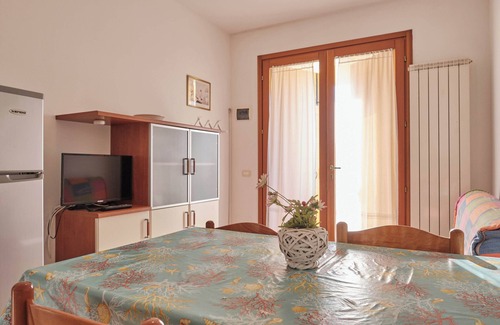 Rosapineta Apartamento | Acogedor apartamento en una residencia con piscina en Rosolina