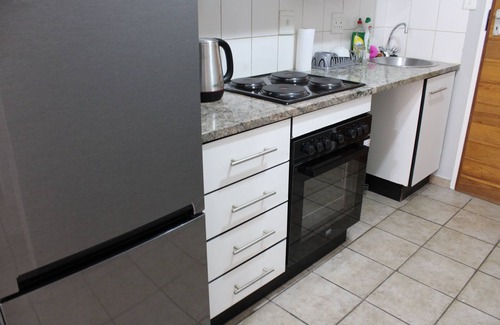 Arcadia Apartamento | Homely studio apartment with a lovely sunset view