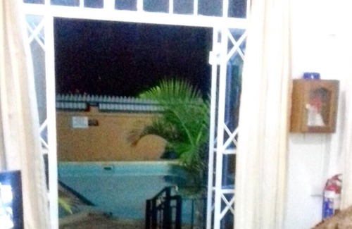 Pointe aux Biches Apartamento | Homerez - ¡A 200 m de la playa! Apartamento para 4 pers. con piscina compartida