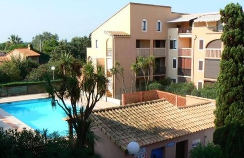 Les Arenes Apartamento | Homerez - Apartamento a 900 m de la playa para 4 pers. con piscina compartida
