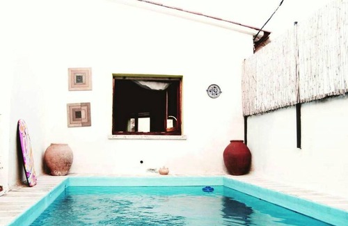 Arbucies Apartamento | Homerez - Apartamento para 3 pers. con piscina compartida y terraza en Arbúcies