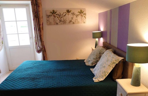 Duravel Apartamento | Homerez - Bonito estudio para 2 pers. con piscina compartida y jardín en Duravel