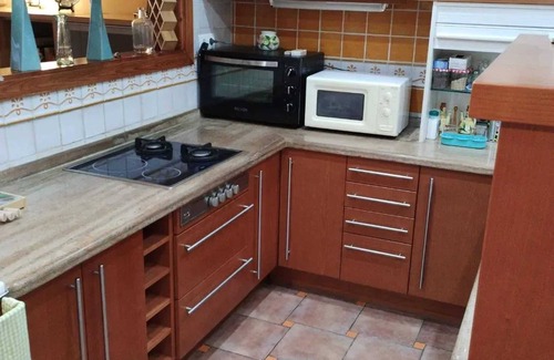 Benalmadena Costa Chalet De Esquí | Homerez - Chalet for 5 ppl. with sea view, garden and balcony at Benalmádena
