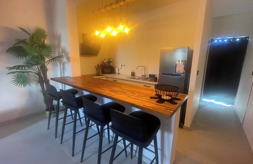 Bras-Panon Apartamento | Homerez - Apartamento encantador en Bras-Panon con jardín cerrado