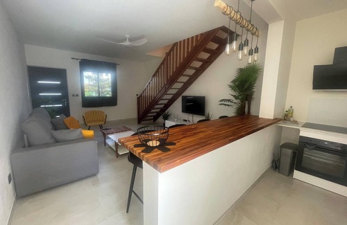 Bras-Panon Apartamento | Homerez - Apartamento encantador en Bras-Panon con jardín cerrado
