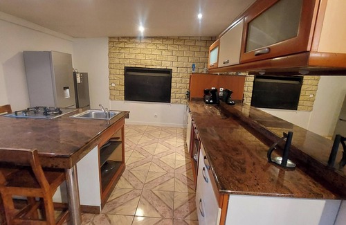 Bois d'Olives Casa | Homerez - Casa elegante en Saint-Pierre con piscina privada