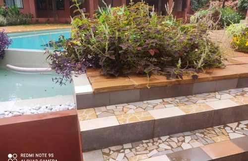 Porto-Novo Apartamento | Homerez - Apartamento para 6 pers. con piscina compartida y jardín en Porto-Novo