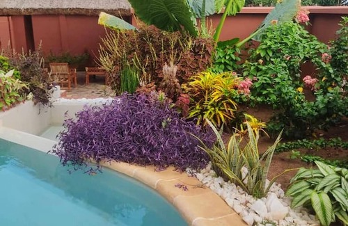 Porto-Novo Apartamento | Homerez - Apartamento para 6 pers. con piscina compartida y jardín en Porto-Novo