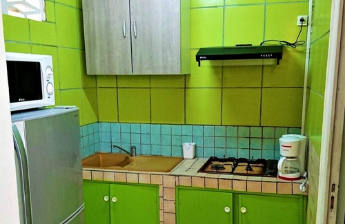Fontaine de Moutte Apartamento | Homerez - Studio 10 km away from the beach for 2 ppl. at Fort-de-France