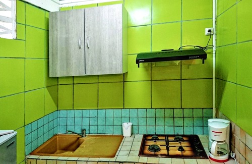 Fontaine de Moutte Apartamento | Homerez - Estudio Fort-de-France vista jardín
