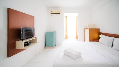 Surabaya Apartamento | Homey Studio Apartment at Dian Regency By Travelio