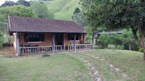 Aiuruoca Casa | Hospedagem Manacás