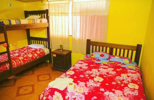 Mindo Casa | Hostal Henrry's