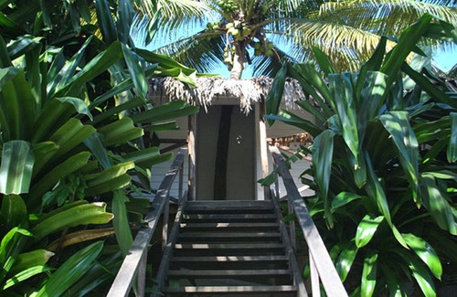 ProCab Apartamento | Hostel room with shared bathroom on tropical lagoon