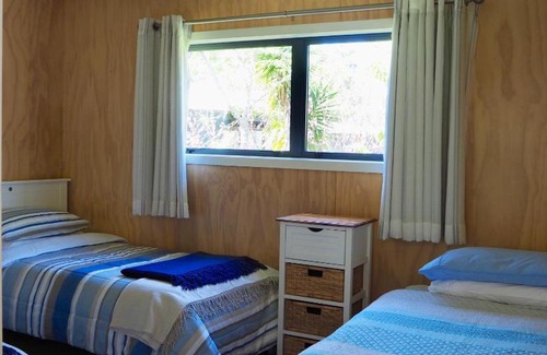 Whitianga Casa | Hosts on the Coast River Cottage